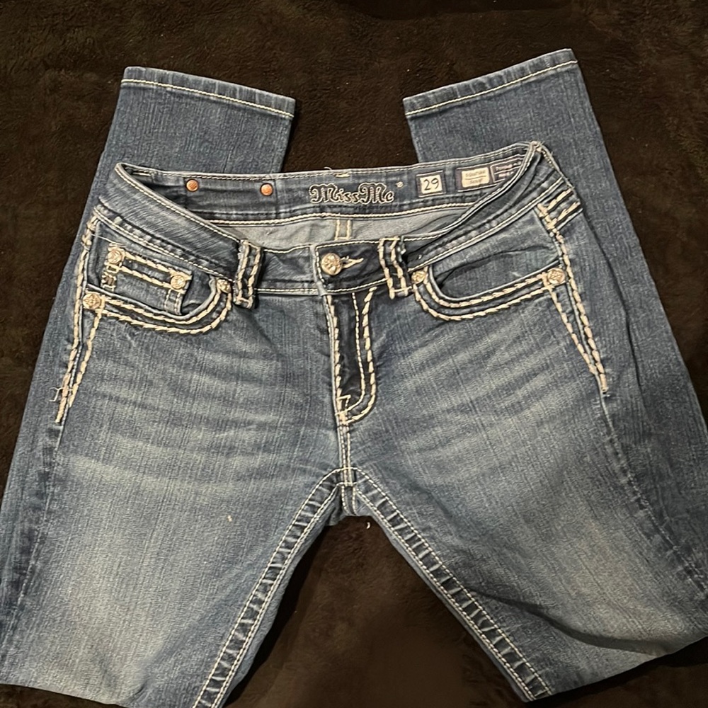 Miss Me jeans, skinny jeans, no holes,missing a stud on the rear brand patch.